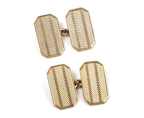 A pair of early 20th century 9ct gold cufflinks, canted rectangular form with engine turned decoration, hallmarks Birmingham 