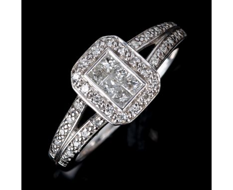 A modern 18ct white gold diamond rectangular cluster ring, set with Princess and round brilliant-cut diamonds, total diamond 