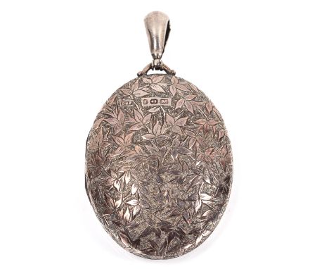 A large Victorian silver locket pendant, engraved leaf decoration, probably by Deakin & Francis Ltd, hallmarks Birmingham 187