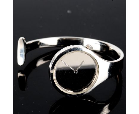 GEORG JENSEN - a Danish stainless steel quartz bangle watch, designed by Vivianna Torun Bulow-Hube, model no. 336, serial no.