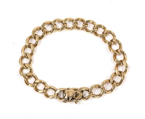 A heavy 9ct gold flat curb link bracelet, hallmarks Birmingham 1972, bracelet length 24cm, 61.5gNo broken links, settings are
