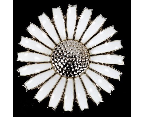 GEORG JENSEN - a Danish sterling silver and white enamel daisy pattern brooch, diameter 43.8mm, 19.6g, boxedNo damage or repa