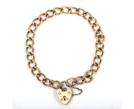 A 9ct gold curb link bracelet with heart padlock, hallmarks Birmingham 1967, bracelet length 18cm, 14.6gNo broken links, sett