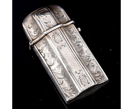 An Antique Dutch silver Vesta case, shaped form with bright-cut engraved decoration, 6cm x 3cmSeveral long edges have a 1.5cm