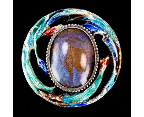 An Arts and Crafts silver enamel and butterfly wing brooch, with tulip surround, by G W Lewis & Co, hallmarks Birmingham 1923
