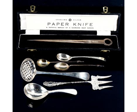Various silver, including Georgian meat skewer pattern paper knife, George III caddy spoon, bread fork etc, 5oz totalLot sold