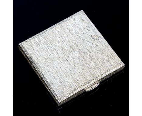An Elizabeth II square silver compact, allover bark effect design, by Kigu Ltd, hallmarks London 1974, 8cm x 8cm, 4.2oz gross