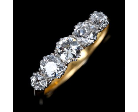 An 18ct gold graduated 5-stone diamond half hoop ring, set with old European-cut diamonds, total diamond content approx 1ct, 