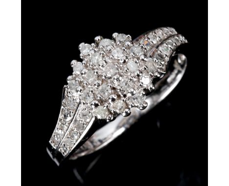 A modern 9ct white gold diamond cluster ring, set with single-cut diamonds, total diamond content approx 0.33ct, setting heig