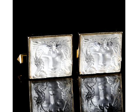 LALIQUE - a pair of gold plated and frosted glass Masque de Femme pattern cufflinks, panel length 15.6mm, 14.8g, boxedNo dama
