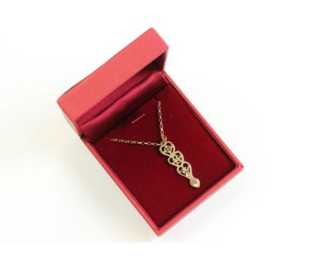 9ct yellow gold pendant necklace, the pendant modelled as a Welsh love spoon, the three hearts containing the Welsh dragon, d