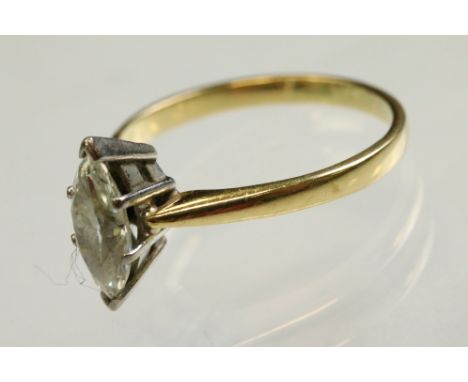 Moissanite 18ct yellow gold solitaire ring, the marquise cut stone measuring approx 10mm x 5mm, claw set, tapered shoulders, 