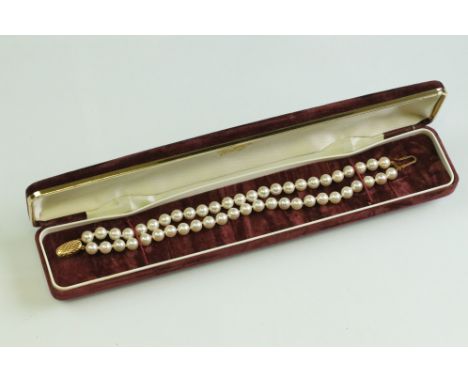 Newquay Prestige cultured pearl 9ct yellow gold two row bracelet, the cream pearls with pink overtones, diameter approx 6mm, 