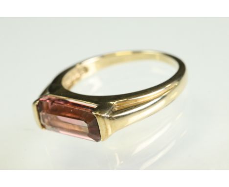 Pink tourmaline 9ct yellow gold ring, rectangular step cut pink tourmaline fading to colourless, dimensions approx 5mm x 11m,