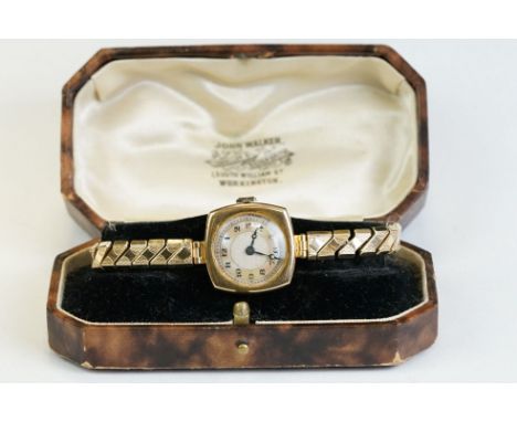9ct gold cased ladies brooch, mother-of-pearl dial, black Arabic numerals and poker hands, replacement straps, cased 