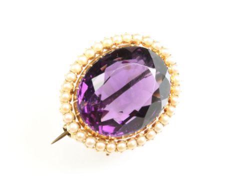 Victorian amethyst and seed pearl unmarked yellow gold brooch, the oval mixed cut amethyst measuring approx 2cm x 2.5cm, claw