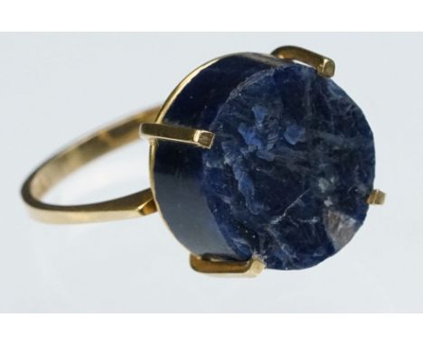 Sapphire 14ct yellow gold ring, the rough blue sapphire diameter approx 14.5mm, four claw setting, ring size Q½ 