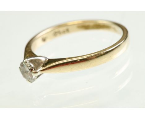 Diamond 18ct yellow and white gold set solitaire ring, the round brilliant cut diamond stated weight 0.25 carat, claw set, ri