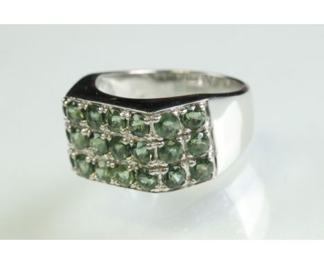 Green sapphire 9ct white gold Gents ring, twenty-four small round brilliant cut green sapphire, grain set, dimensions of head