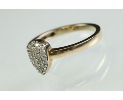 Diamond 9ct yellow and white gold set ring, the pear shaped head set with small round brilliant cut diamonds, shared claw set