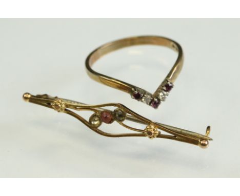 Ruby and diamond 9ct yellow gold wishbone ring, size M½; together with an Edwardian paste set 9ct gold bar brooch, replacemen