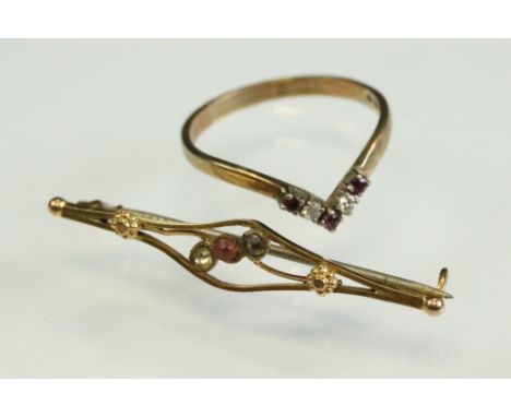 Ruby and diamond 9ct yellow gold wishbone ring, size M½; together with an Edwardian paste set 9ct gold bar brooch, replacemen