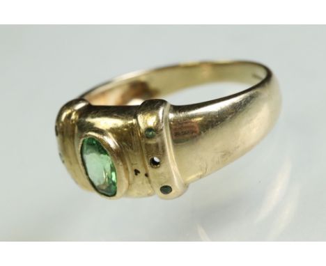 Tsavorite garnet 9ct yellow gold Gents ring, the oval mixed cut tsavorite garnet measuring approx 7mm x 4.5mm, rubover set, s