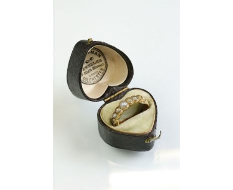 Victorian pearl yellow gold ring, six graduated split pearls (one deficient) partial rubover set, cast rose bud shoulders, th