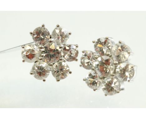 Colourless zircon flower head silver earrings, seven zircon stones, shared post settings, diameter of head approx 14mm, post 