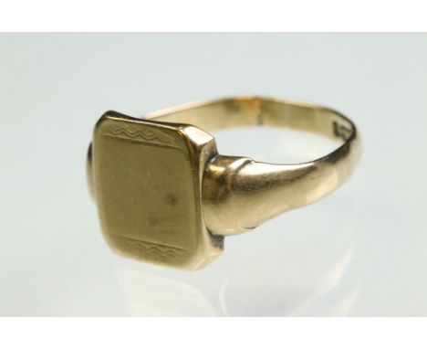 9ct yellow gold signet ring, square head measuring approx 11.5mm x 10.5mm, tapered shoulders, ring size Q½ 