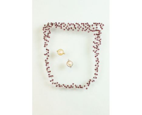 Garnet necklace, small round faceted garnet beads suspended from white metal chain (missing clasp) together with a cultured p