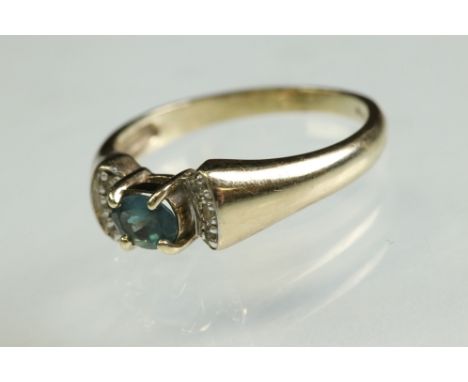 Alexandrite and diamond 9ct yellow and white gold ring, the oval mixed cut alexandrite measuring approx 4mm x 5mm, claw set, 