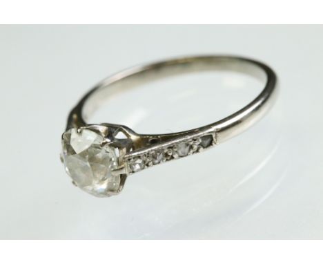 Early 20th century diamond 18ct white gold platinum set solitaire ring, the round old cut diamond weighing approx 1.50 carats