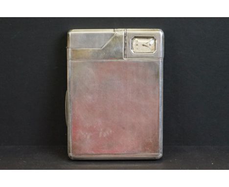 Alfred Dunhill &amp; Sons - A rare silver combination cigarette case, with integrated lighter and manual-wind clock, the body