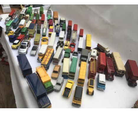 A box of playworn diecast vehicles including Corgi, etc