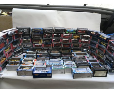 A collection of boxed Diecast vehicles including Cararama, Maisto, Corgi etc