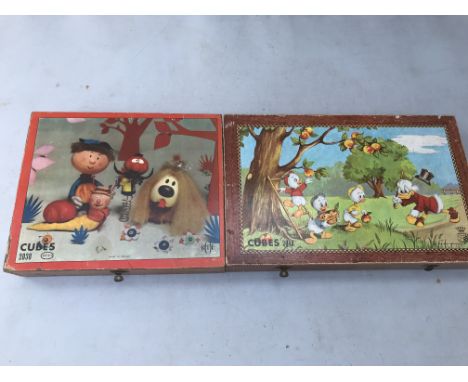 Cubes , 2 cube jigsaws of Magic roundabout and Disney Donald Duck, both in wooden boxes ad complete