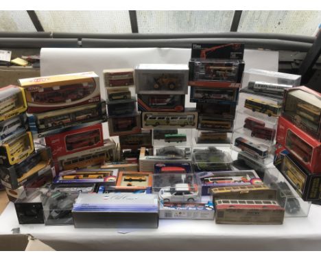 A collection of boxed diecast vehicles including Corgi, Solido, Sikh, EFE, etc