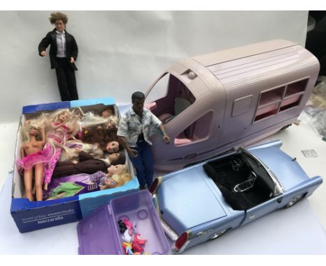 A collection of dolls including Barbie, Frozen and other Mattel dolls, a Barbie train with audible noise and rolling landscap