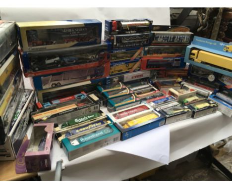 A collection of boxed Diecast lorries including Corgi, Cararama etc