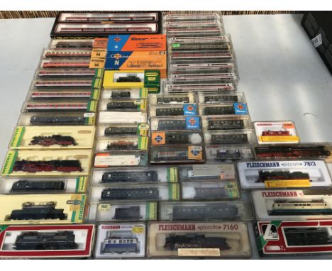 Fleischmann, Roco, Ibertren and Minitrix , N gauge railway, boxed Locomotives, carriages and rolling stock