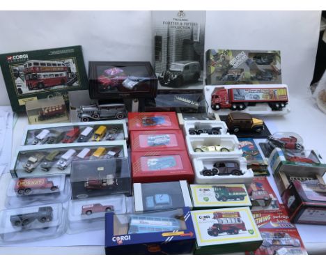 A collection of boxed diecast vehicles including Corgi, Cararama etc