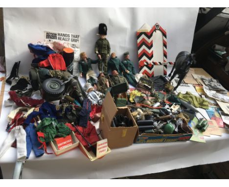 A large collection of Action man including figures, clothing, motor bike and sidecar, a horse , lots of accessories, boots, h