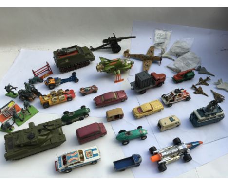 A collection of playworn diecast  vehicles including Dinky, Corgi, Matchbox etc