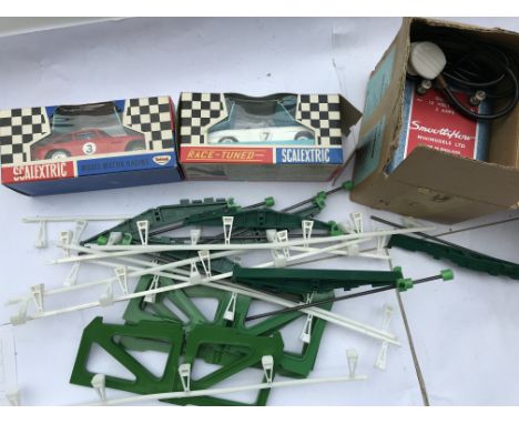 Triang Scalextric, boxed, C68 Aston Martin and C94 Mercedes plus a transformer and extras for ramping the track