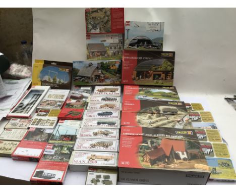 A collection of model kits , HO scale , including Faller, Preiser, Busch etc