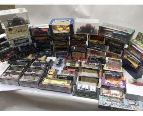 A collection of boxed diecast vehicles including Corgi, Cararama etc