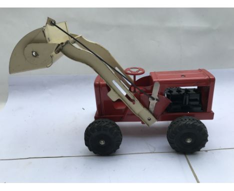 Triang tinplate tractor , in good working order , exhaust is missing