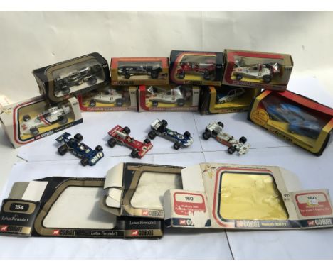 A box of Corgi Whizzwheels F1 cars, including a rare export Graham Hill racing car, boxed