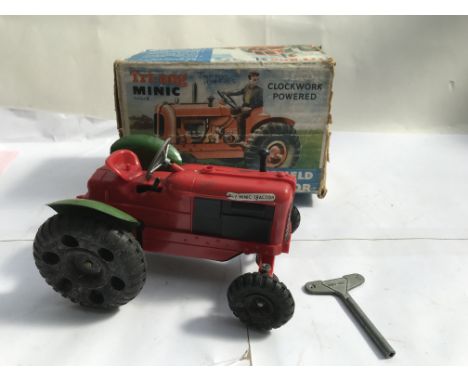 Triang Minic, clockwork, Nuffield Tractor, with key and boxed
